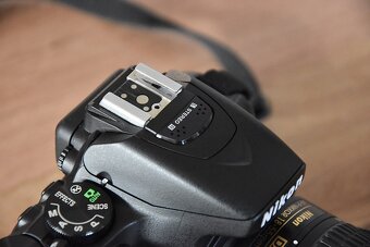 Nikon D5600 wifi BT - dotyk.dis. - VR objektiv AF-P 3tis.sn - 9