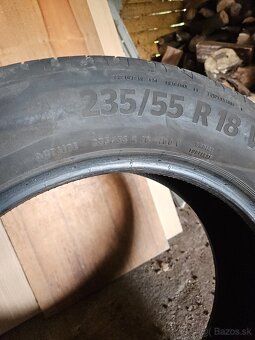 235/55R18 - 9
