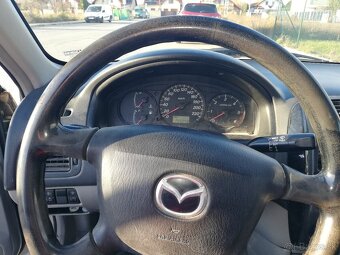 Mazda 323 - 9