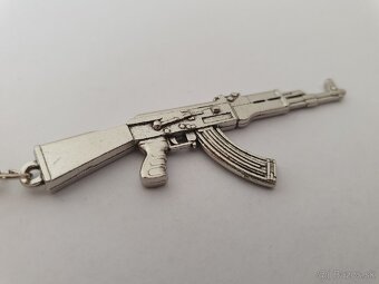 Kľúčenky v tvare strelnej zbrane 1 - 9