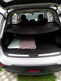 Nisan Qashqai+2 - 9