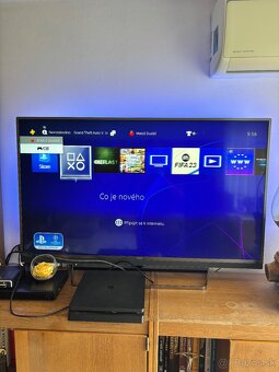 Playstation 4 slim 1TB - 9