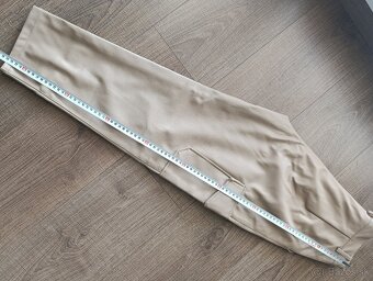 Koženkové nohavice 34 - 9