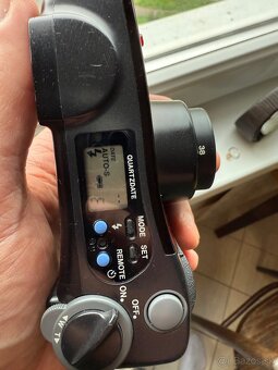 Olympus superzoom 70 - 9