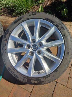 Pneumatiky a disky Mazda 3 - 9